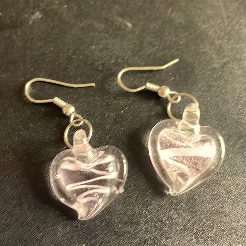 Dainty light pink glass earrings.